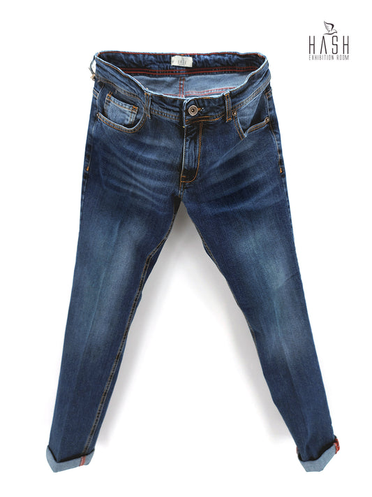 Jeans Modello Cinque Tasche Lavaggio Medio Baffato Stone Wash